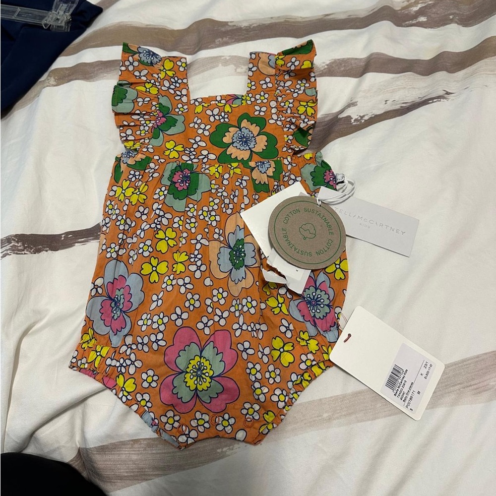 Stella McCarthy baby romper